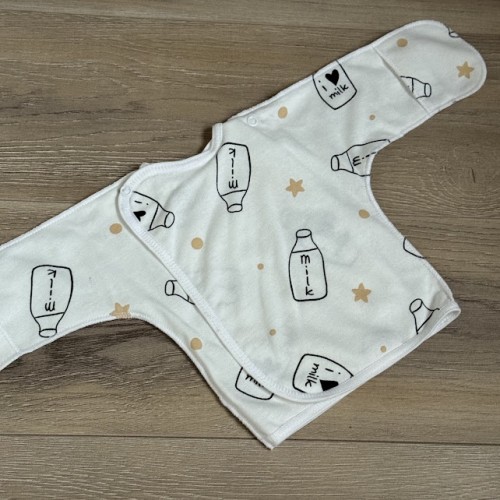 Купить оптом комплект для новонароджених "milk"  (байковий)